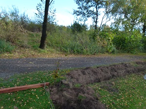uitgraven voor de beukenheg bij chalet 236